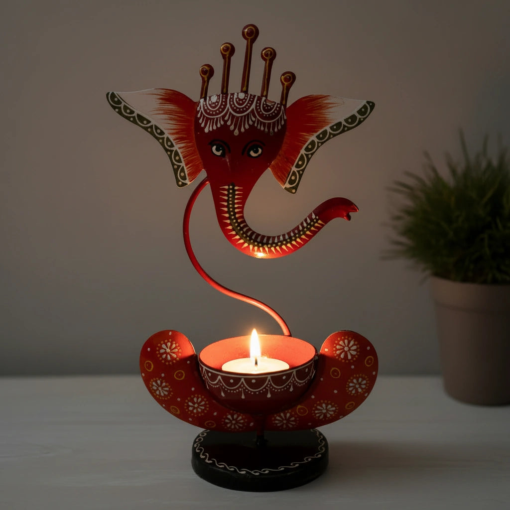 25cm tall metal Ganesh idol featuring a secure tealight holder for pooja and meditation.