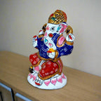 Vibrant multi-color lotus Ganesha statue for pooja room décor