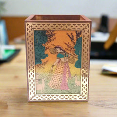 Wood pen stand featuring gemstone painting on glass front panel.