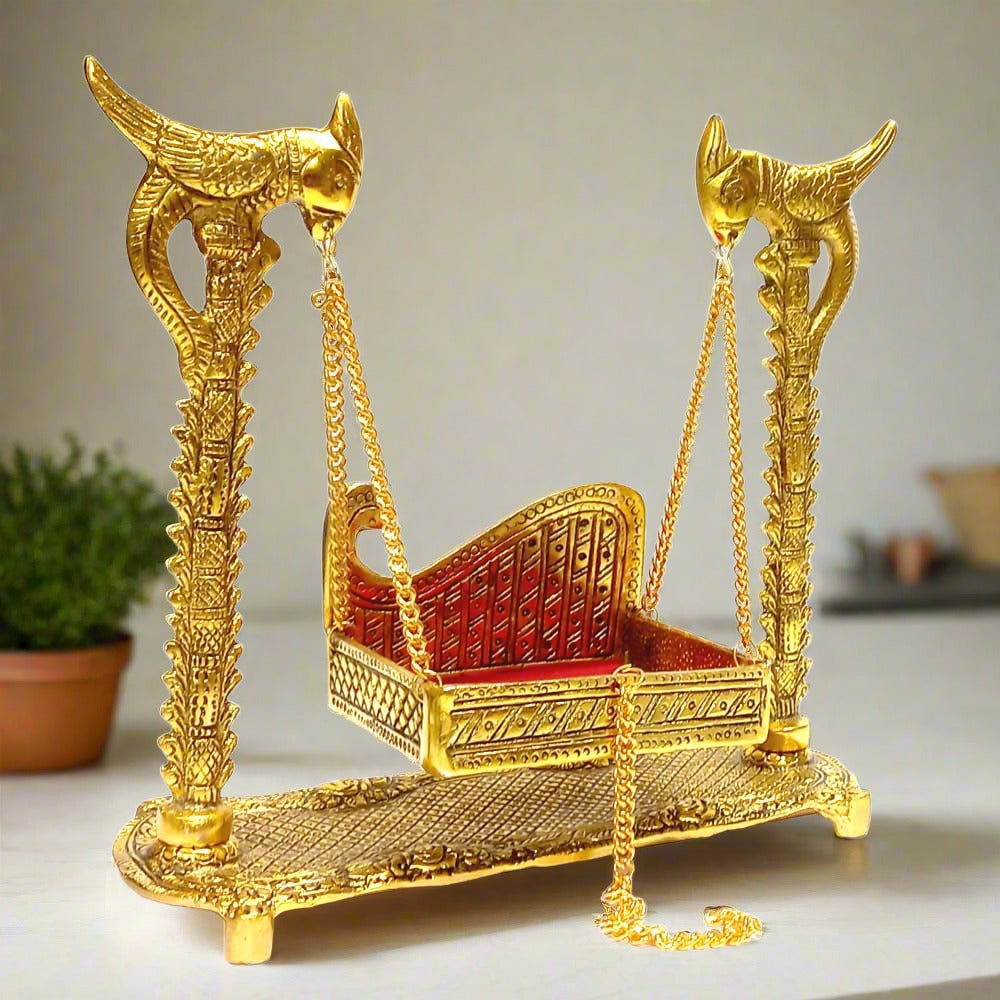 Golden Krishna Jhula swing with parrot design and velvet seat for Janmashtami.