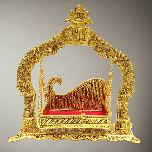 Golden oxidized metal Krishna Jhula swing with intricate design for home temple.