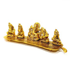 A golden oxidized metal Ganesh figurine, a perfect and unique gift for home decor.