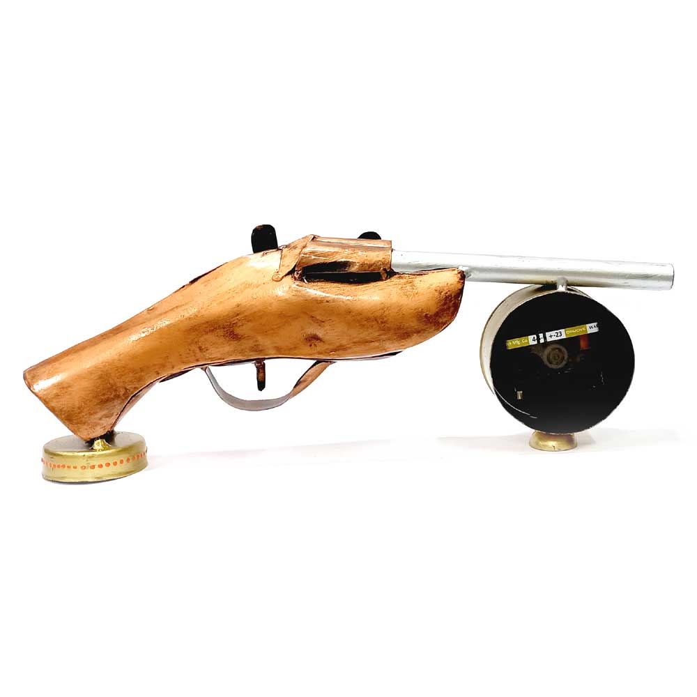 A metal gun motif desk organizer and table clock, a wonderful and functional showpiece.