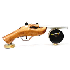 A metal gun motif desk organizer and table clock, a wonderful and functional showpiece.