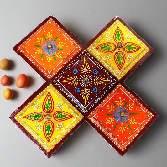 A hand-crafted wooden dry fruit box with a beautiful hand-painted design.