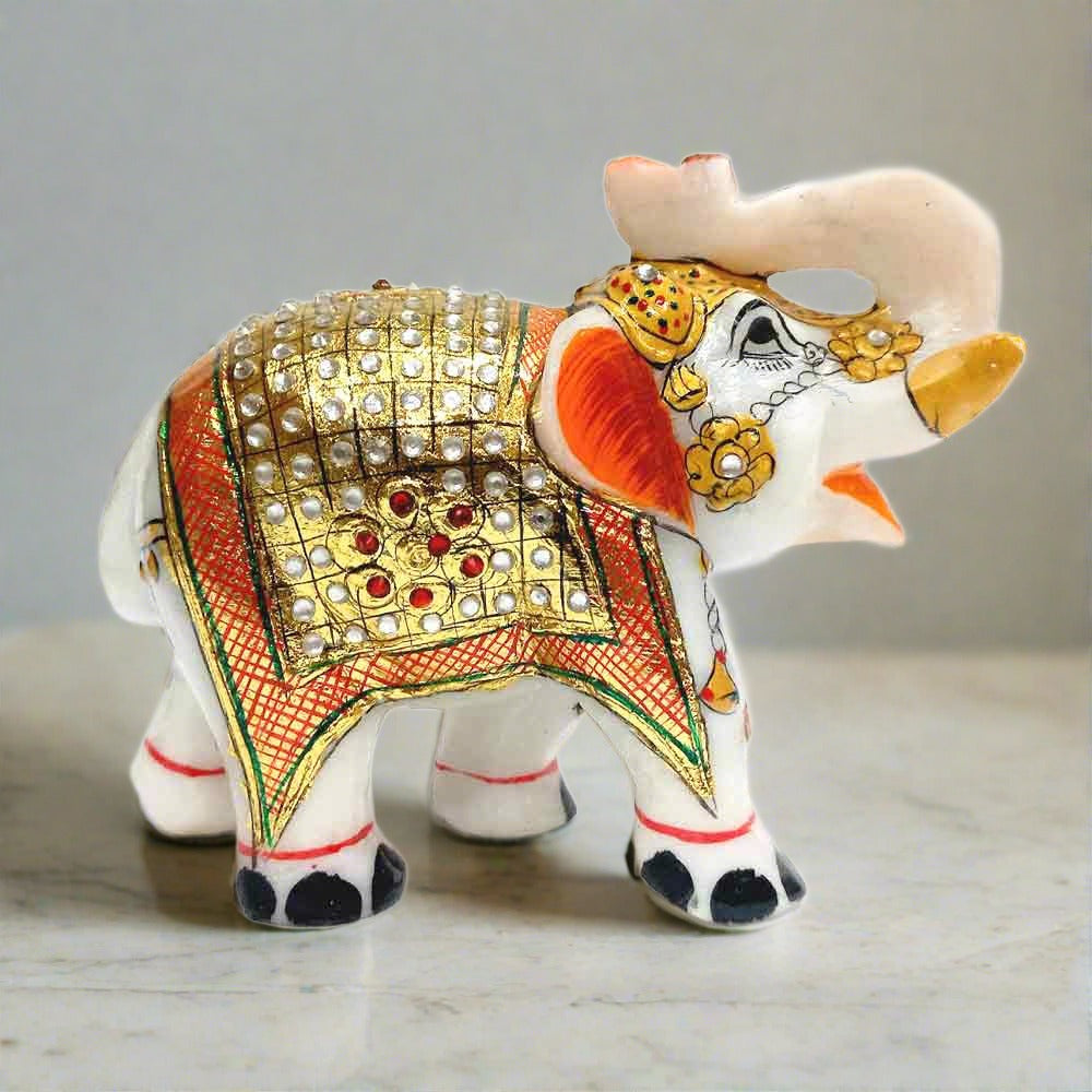 Intricate handmade painting detail on salami trunk marble showpiece.