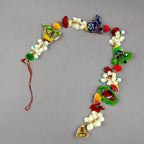 A hand-painted papermache toran, a traditional and vibrant door hanging.