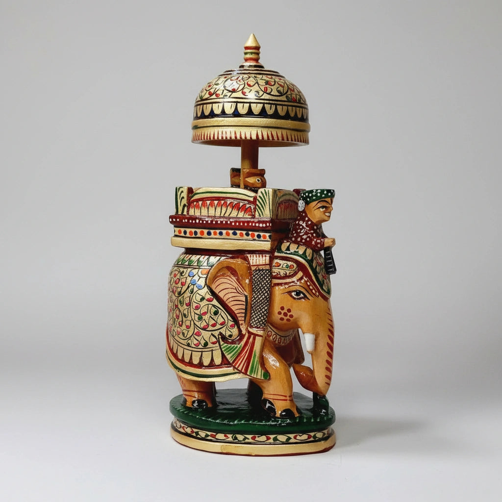 Detailed view of the intricate floral painting and fine brushwork on a Maharaja elephant sculpture.