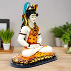A hand-painted Lord Shiva statue crafted from durable resin, a divine and elegant housewarming gift.