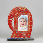 Large 11x9 inch hand-painted red wooden elephant photo frame with detailed white and gold emboss painting, holding a 6x4 landscape photograph.