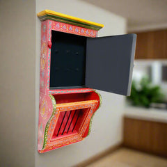 Decorative wooden organizer with hooks and paper holder, colorful hand-painted design