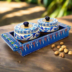 A hand-painted wooden tray with two round-shaped containers, decorated with amazing finishing.