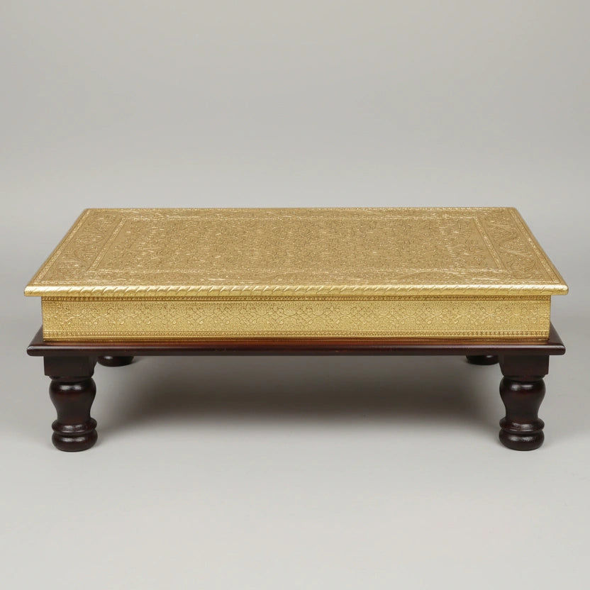 Detailed view of brass work and Rajasthani artisan carving on a wooden Bajot.