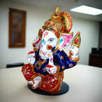 Intricately designed meenakari Ganesha idol, remover of obstacles