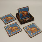Top-down view of six colorful handcrafted wooden coasters arranged in a circle to show unique designer patterns.