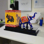 A handmade elephant desk organizer, perfect for holding pens and pencils.