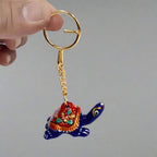 Handcrafted metal tortoise keychain in traditional Meenakari art