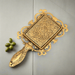 Elegant golden oxidized finish metal hand mirror, artisanal vintage-style design