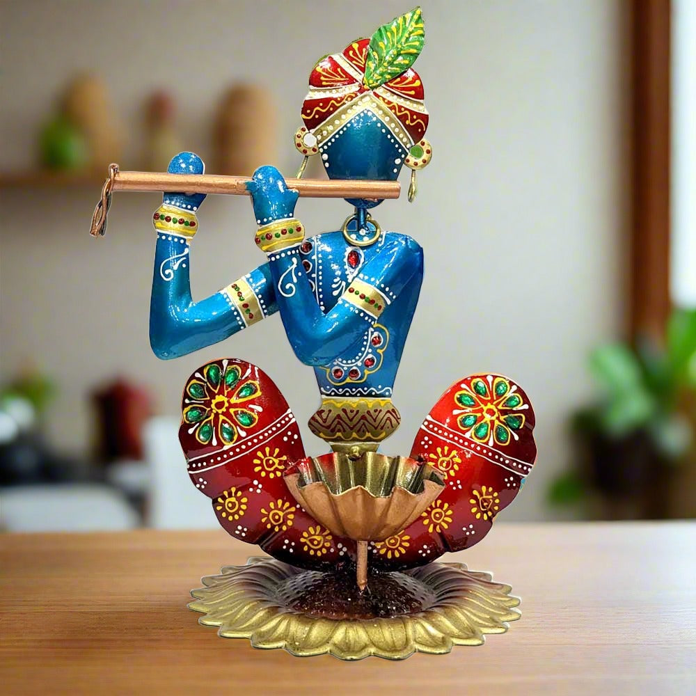 A handcrafted, multicolor Krishna tealight holder, perfect for home decor.