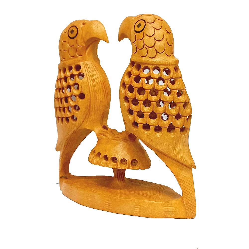 Handcrafted wooden parrot statue with fine undercut craftsmanship.