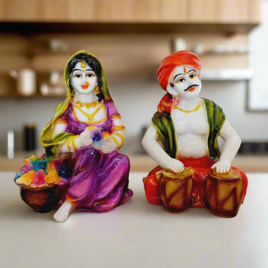 Decorative Rajasthani couple statues, handcrafted with intricate painting details