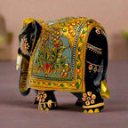 Handcrafted Rajasthani wooden elephant with royal emboss painting and red-green floral pattern