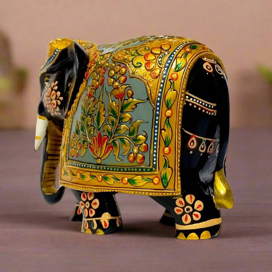 Handcrafted Rajasthani wooden elephant with royal emboss painting and red-green floral pattern