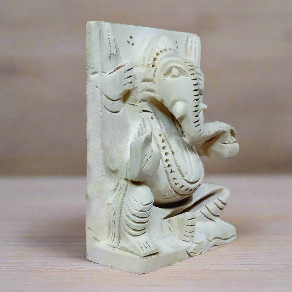 Auspicious Sevan wood Ganesh statue for blessings and home decor