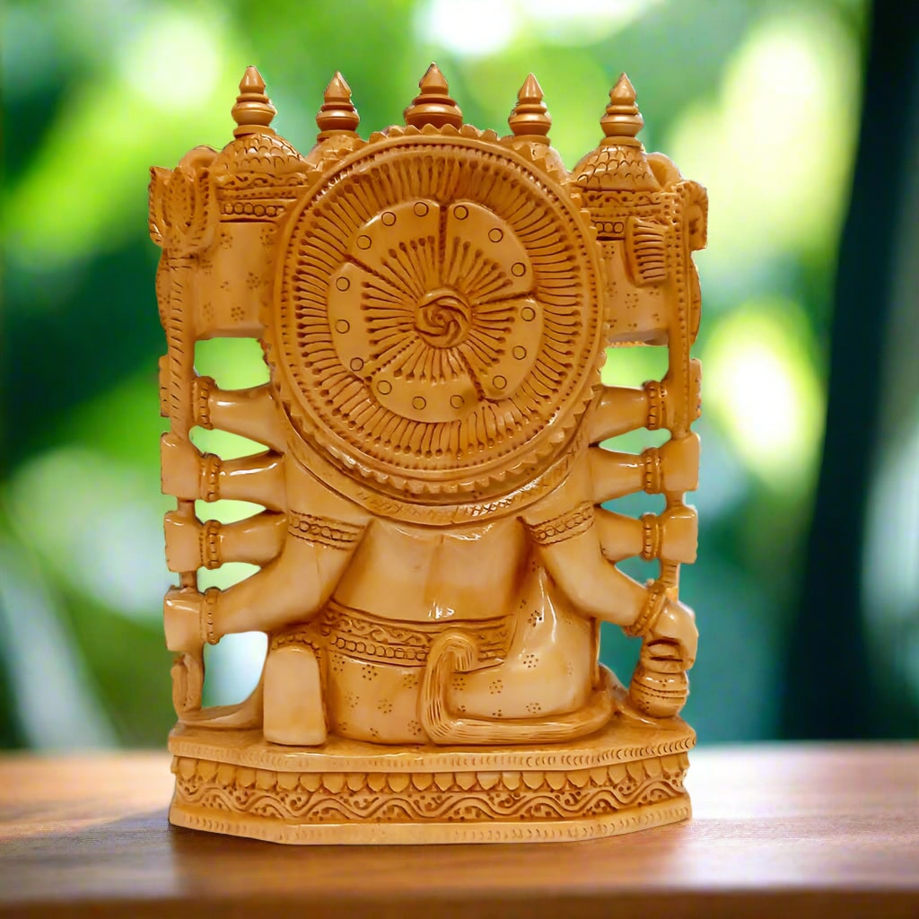 Sacred wooden Hanuman idol with five faces, symbolizing protection and strength