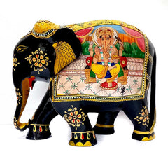 A handcrafted wooden Ganesha statue, perfect for a pooja room or home temple.