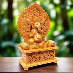 Handcrafted wooden Ganesha idol with floral carved arch and lattice design.