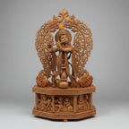 Handcrafted wooden Krishna idol with intricate jali arch and peacocks — Jaipur wood carving