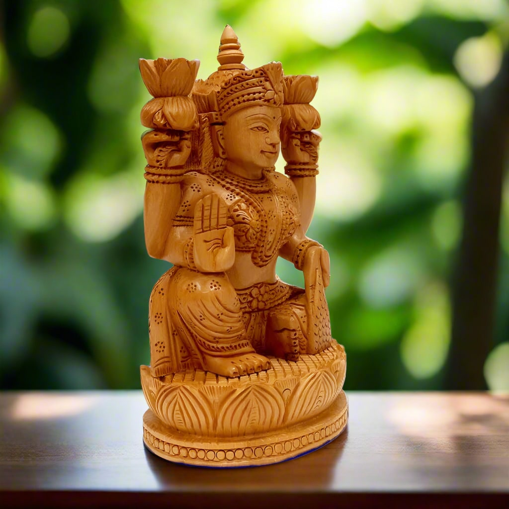 Wooden Lakshmi idol with intricate carvings, traditional handcrafted Indian murti