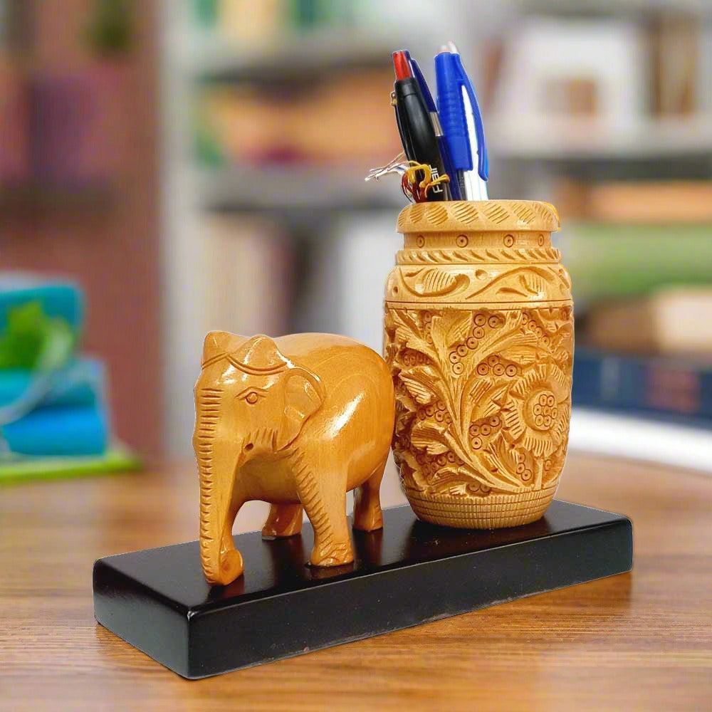 Handcrafted wooden pen stand showcasing the vibrant art of Rajasthan.