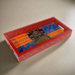 Handcrafted wooden tray with vibrant traditional hand-painted designs in assorted colors