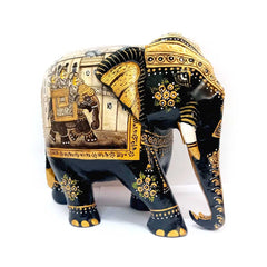 A handmade elephant figurine, a small piece of Indian art for your desk or shelf.