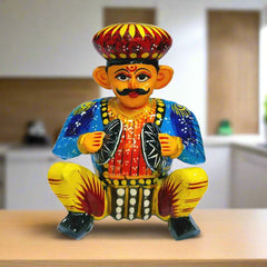 Artisan-made Bawla puppets featuring intricate hand-painted details