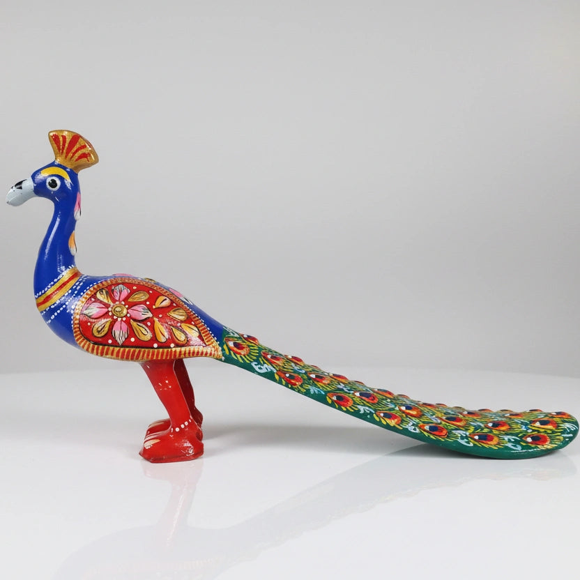Handmade metal peacock statue with multicolor Jaipuri Meenakari enamel painting for home decor.