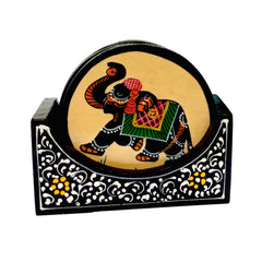 A handmade wooden coaster showpiece set with elephant painting, a beautiful addition to any table.