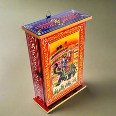 A handmade wooden key box decorated with fine quality traditional Indian art painting.