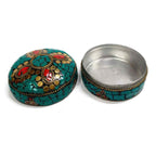 Handcrafted kumkum box with secure lid and stone design