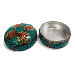 Handcrafted kumkum box with secure lid and stone design