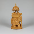 Hand-carved wooden elephant reflecting India royal heritage and Maharaja era grandeur.