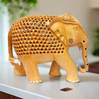 An intricate carving of a wooden elephant masterpiece, a stunning showpiece for any home.