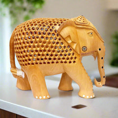 An intricate carving of a wooden elephant masterpiece, a stunning showpiece for any home.
