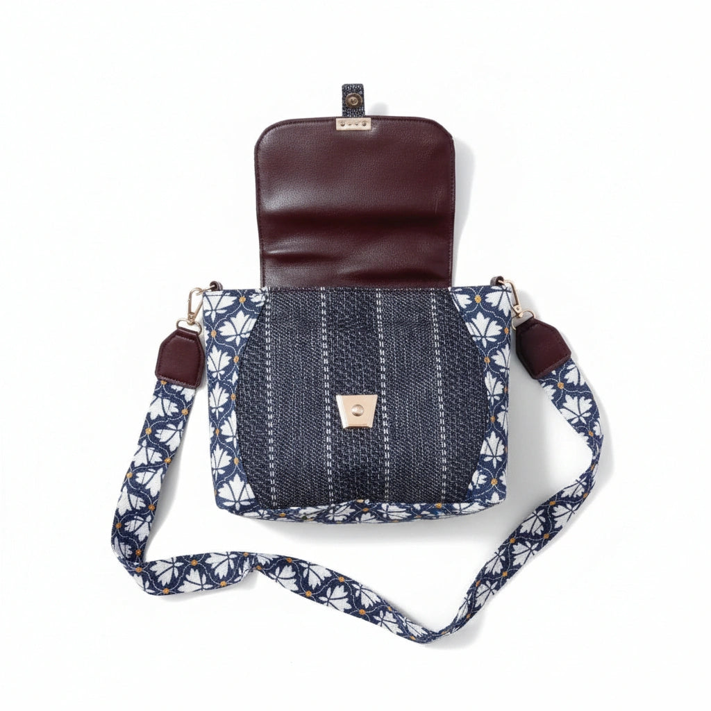 Detailed shot showing the contrast between the floral Jacquard and dark brown leather