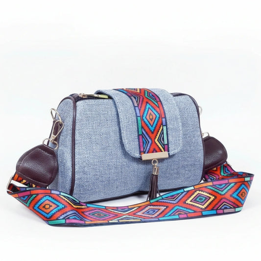 Premium jacquard woven bag featuring a stylish leather tassel and magnetic closure