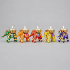 Close view of a handcrafted Jaipur elephant candle holder showing sequin work and lace border, lit for Diwali decor