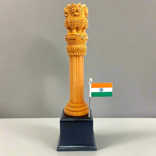 An Ashoka Pillar made from Kadamba wood, featuring intricate carvings on its tall cylindrical shape.