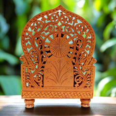 Kadamba wood Ganesha idol with blessing gesture and beautifully carved arch design